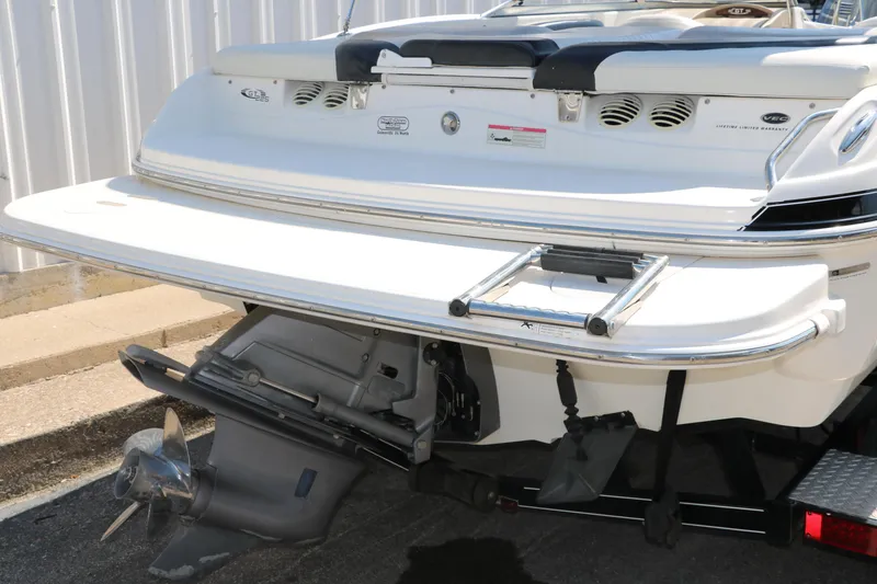 Slide: The Image of 2008 Glastron GT225 boat stern with swim platform and ladder. - 5