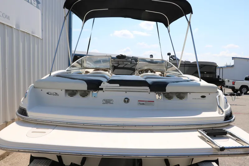 Slide: The Image of 2008 Glastron GT225 boat with bimini top, rear view. - 6