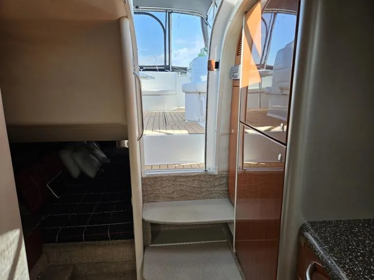 Slide: The Image of Interior view of 2007 Formula 400 Super Sport yacht, showing cabin and steps to deck. - 22