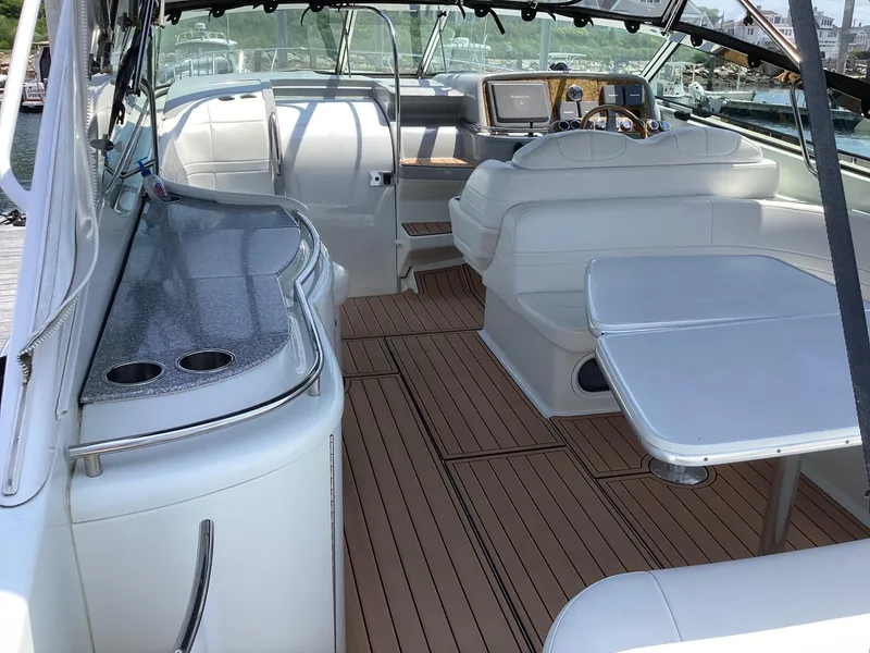 Slide: The Image of Interior of a 2007 Formula 400 Super Sport boat with seating and navigation area. - 6