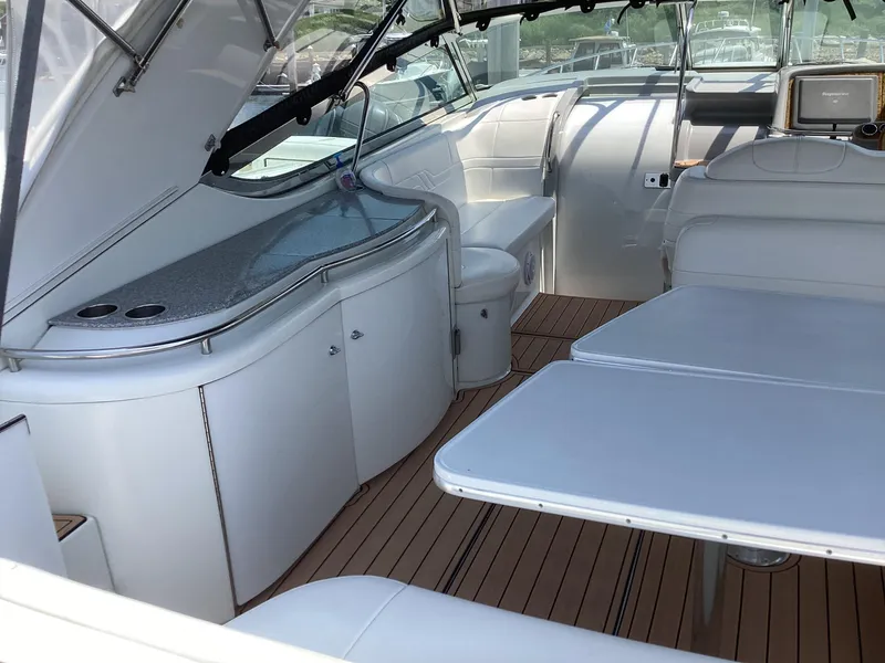 Slide: The Image of 2007 Formula 400 Super Sport yacht interior with white seating and wooden flooring. - 7