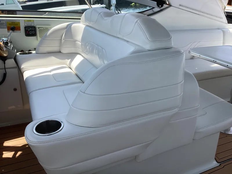 Slide: The Image of 2007 Formula 400 Super Sport boat interior with white leather seating. - 9