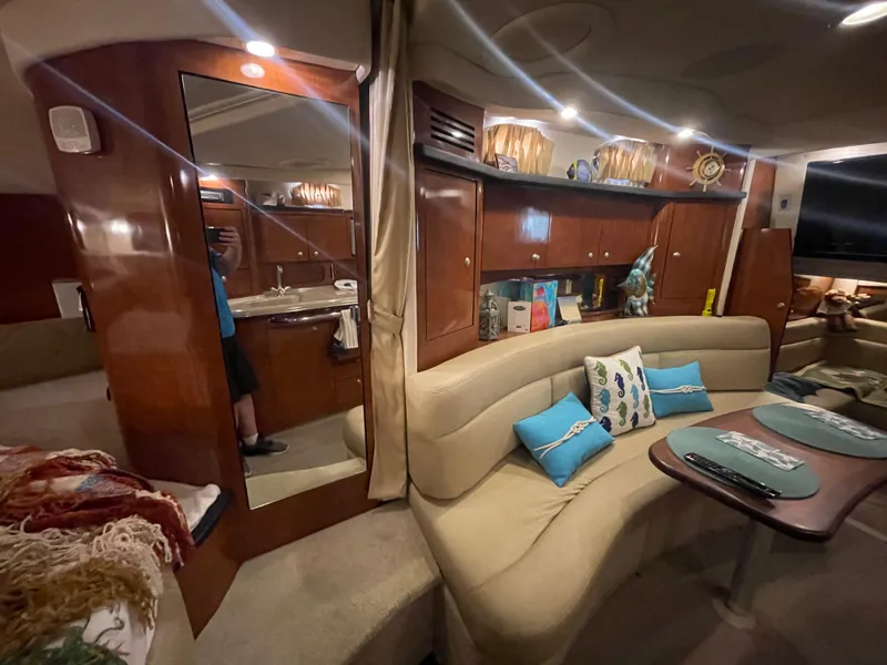 Slide: The Image of Luxurious interior of a 2007 Sea Ray 340 Sundancer yacht with plush seating and elegant decor. - 11