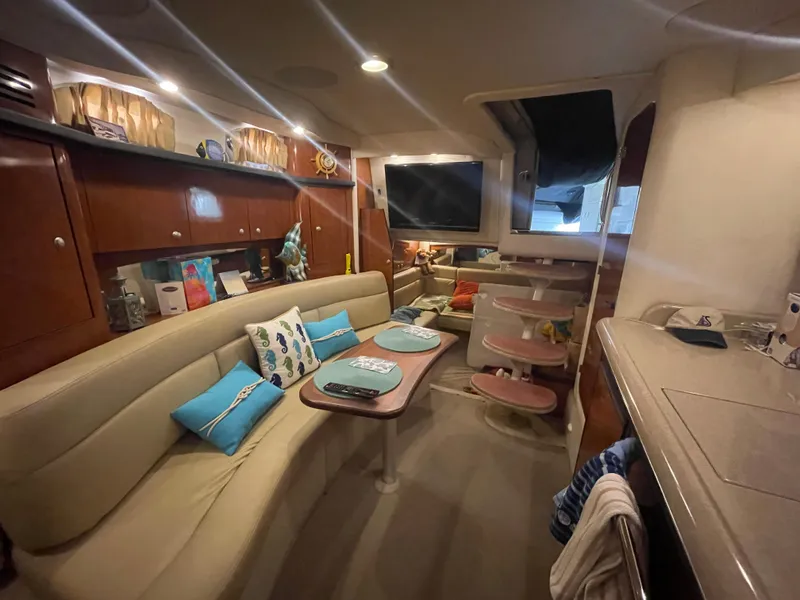 Slide: The Image of Luxurious 2007 Sea Ray 340 Sundancer cabin interior with plush seating and modern amenities. - 12