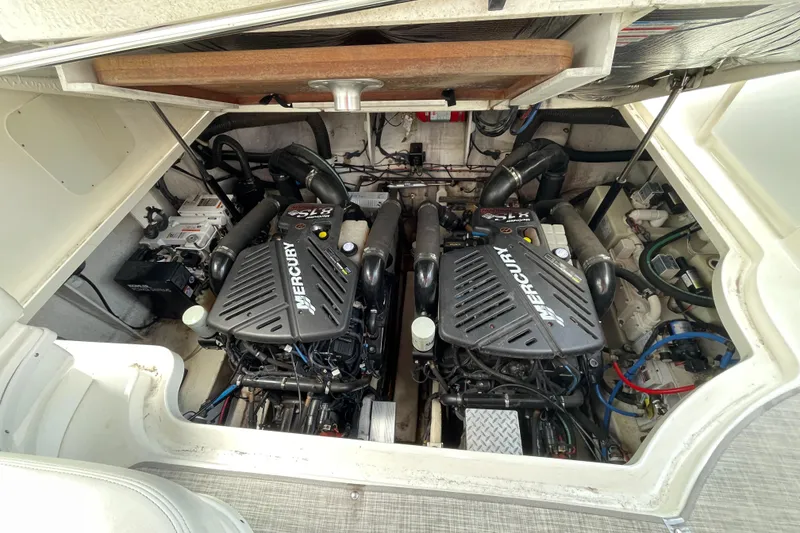 Slide: The Image of Engine compartment of 2007 Sea Ray 340 Sundancer with twin Mercury engines. - 22