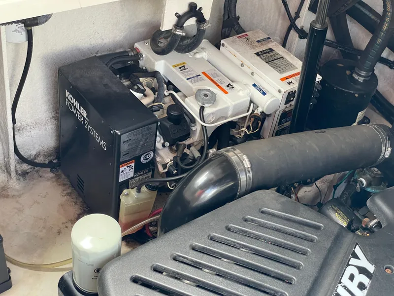 Slide: The Image of Engine compartment of 2007 Sea Ray 340 Sundancer with Kohler power system. - 29