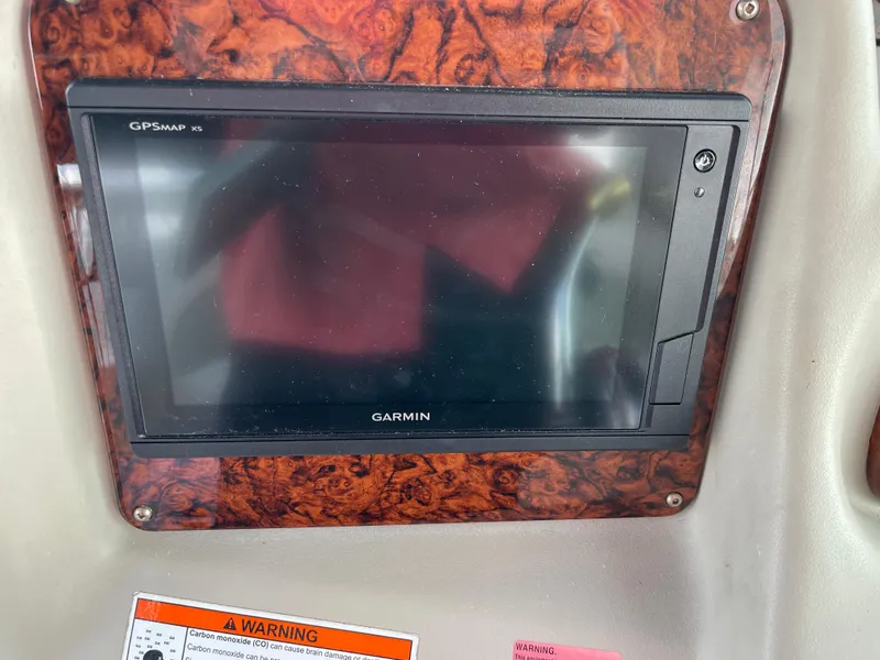 Slide: The Image of Garmin GPSMAP 4212 on 2007 Sea Ray 340 Sundancer dashboard with wood paneling. - 36