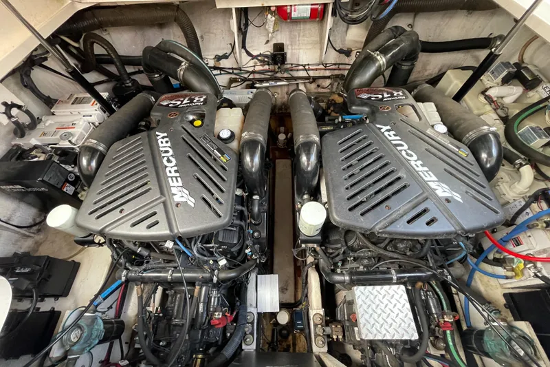 Slide: The Image of Engine room of 2007 Sea Ray 340 Sundancer with twin Mercury engines. - 40