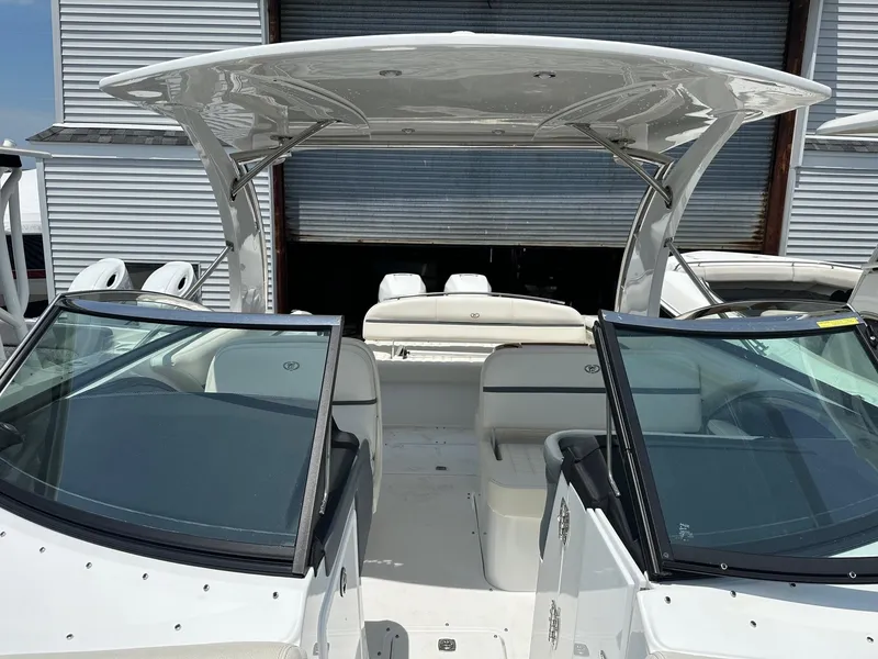 Slide: The Image of 2021 Cobalt 30SC Outboard boat with dual windshields and spacious seating. - 23