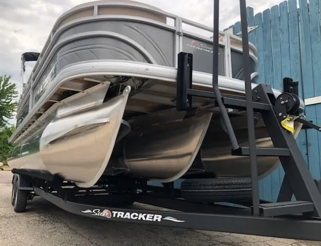 Slide: The Image of 2024 Sun Tracker Party Barge 22 XP3 pontoon boat on trailer. - 3