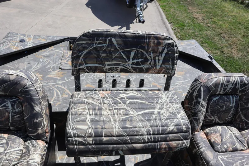 Slide: The Image of 2024 War Eagle 2170 Blackhawk boat with camo seating and deck. - 11