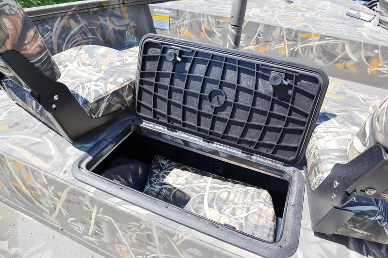 Slide: The Image of 2024 War Eagle 2170 Blackhawk boat with open storage compartment. - 13