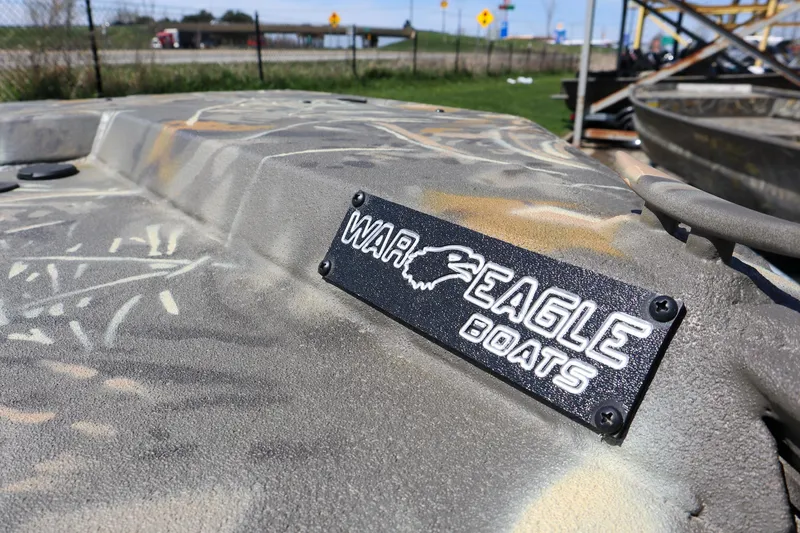Slide: The Image of 2024 War Eagle 2170 Blackhawk boat with logo in focus. - 16