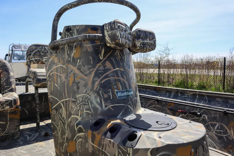 Slide: The Image of 2024 War Eagle 2170 Blackhawk boat with camouflage design. - 8