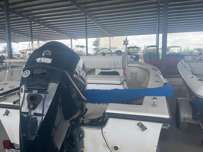 Slide: The Image of Custom 1997 C Halk 18 boat with Evinrude 115 outboard motor in covered storage. - 5
