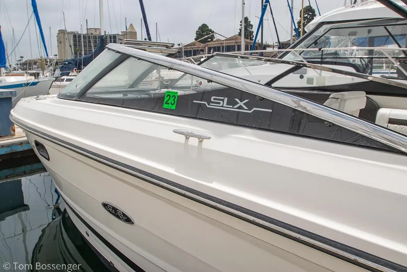 Slide: The Image of 2017 Sea Ray SLX 280 boat docked in marina, side view. - 3
