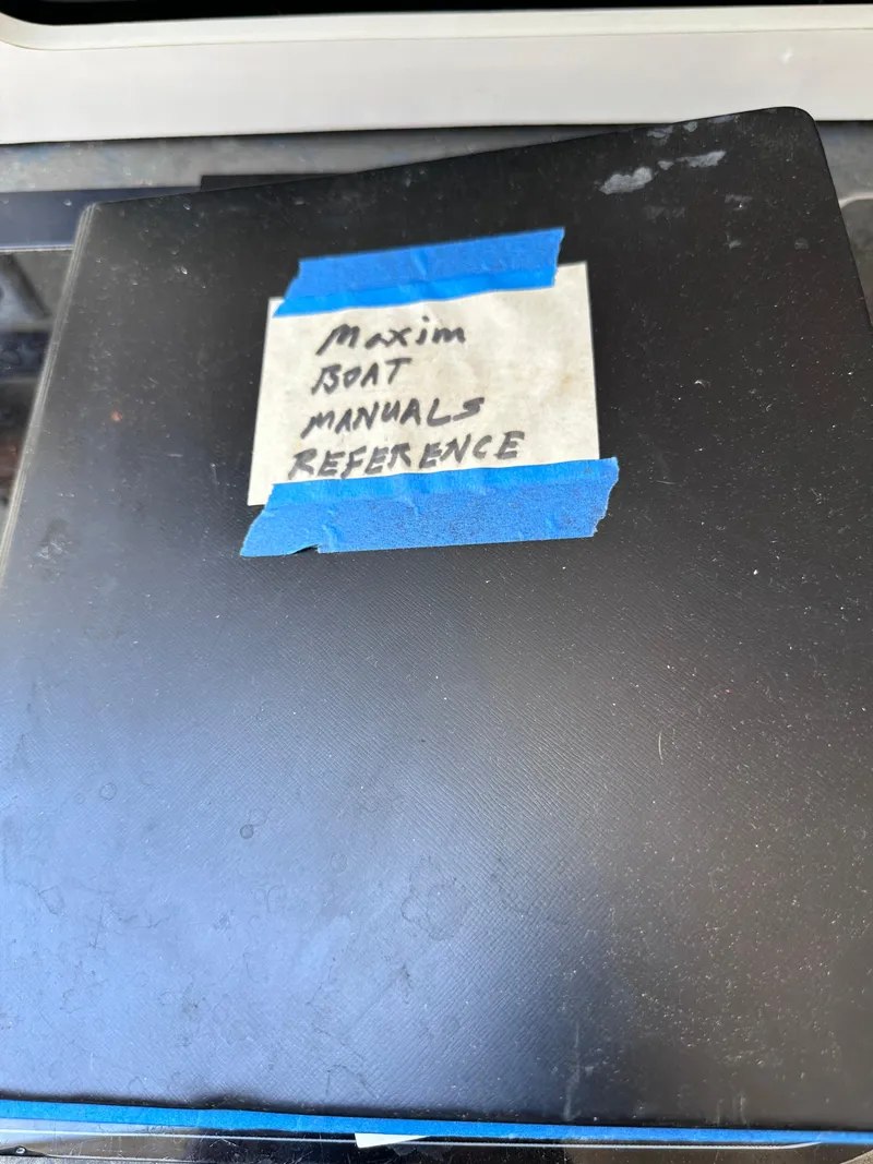 Slide: The Image of Maxum 2400 SCR 1996 boat manuals reference binder. - 14