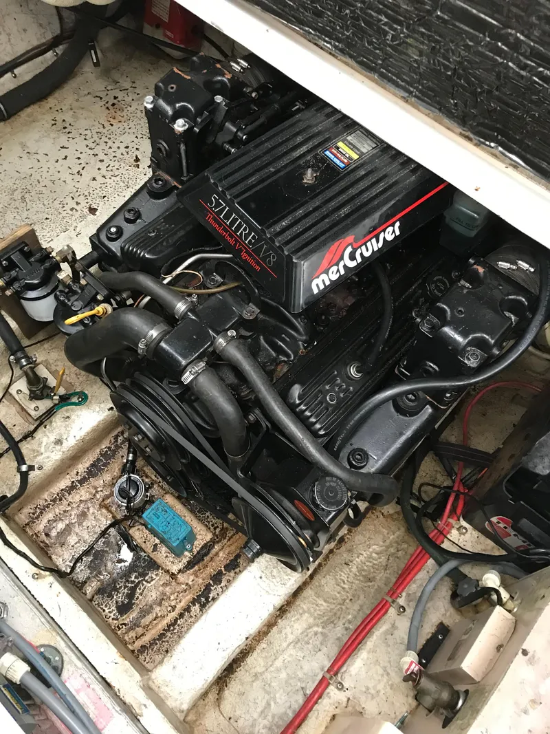 Slide: The Image of 1996 Maxum 2400 SCR engine compartment with MerCruiser 5.7L V8 engine. - 27