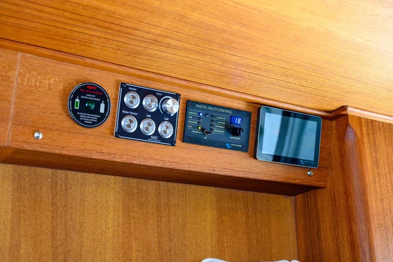 Slide: The Image of Control panel of 2023 Targa 46 yacht with digital display and switches. - 22