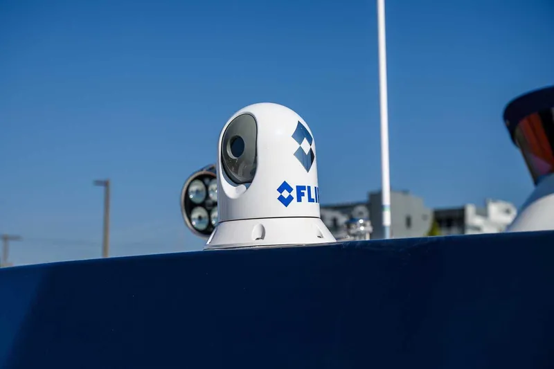 Slide: The Image of FLIR camera on 2023 Targa 46 boat under clear blue sky. - 6