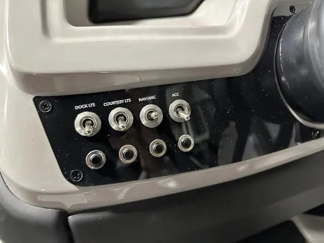 Slide: The Image of Dashboard of 2025 Barletta Boats Cabrio C22UC with dual gauges. - 26