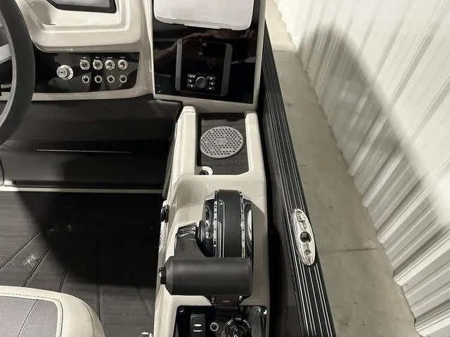 Slide: The Image of Control panel of 2025 Barletta Boats Cabrio C22UC with ignition and canopy switch. - 29