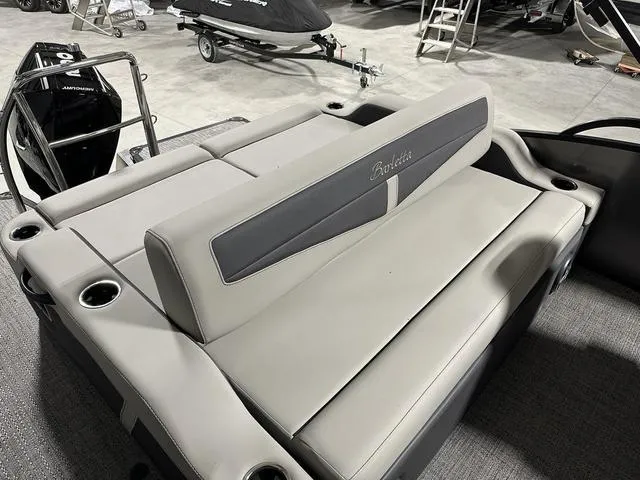 Slide: The Image of 2025 Barletta Boats Cabrio C22UC pontoon boat, top view, spacious seating, and canopy. - 7
