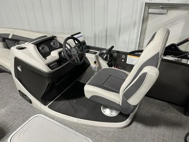 Slide: The Image of Interior of 2025 Barletta Boats Cabrio C22UC, featuring modern seating and flooring. - 9