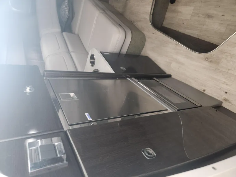 Slide: The Image of Interior of a 2018 Formula 310 Sun Sport boat with modern amenities. - 25