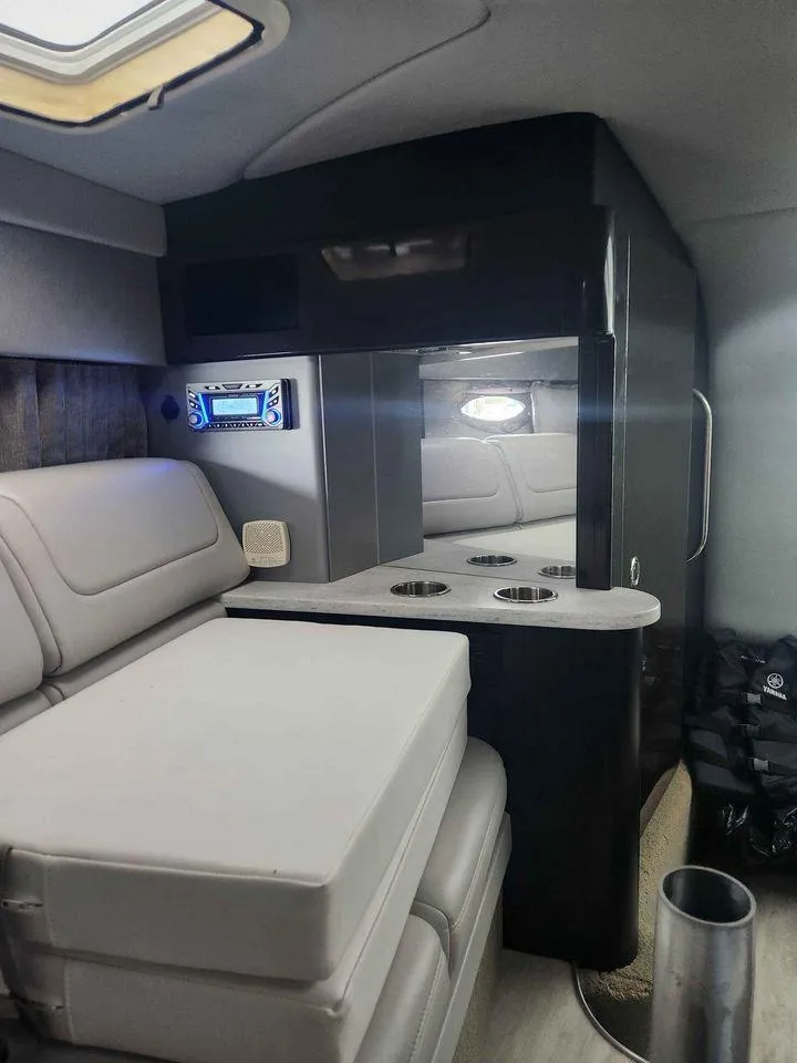 Slide: The Image of Interior cabin of a 2018 Formula 310 Sun Sport boat with seating and kitchenette. - 31