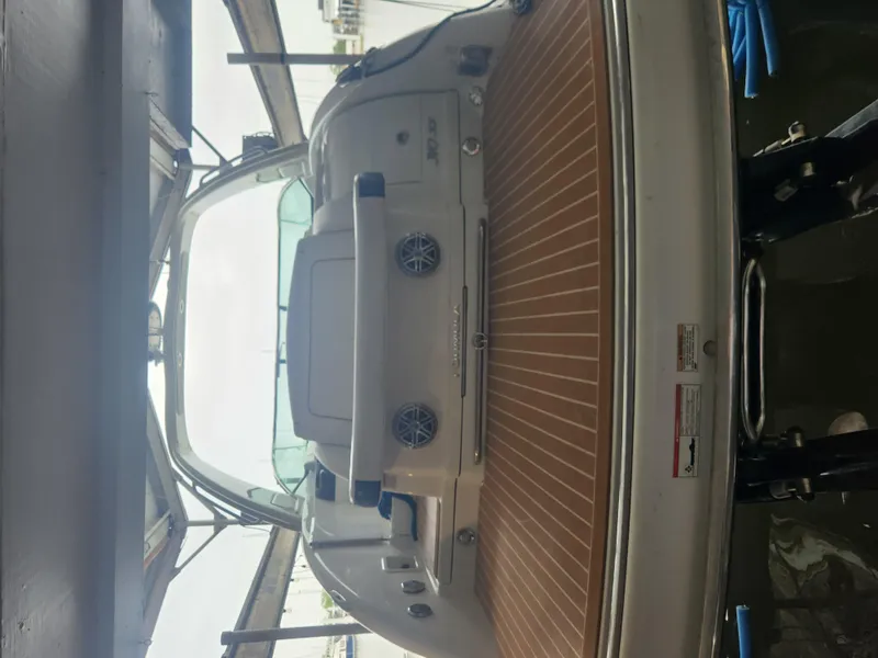 Slide: The Image of 2018 Formula 310 Sun Sport boat docked, rear view. - 32