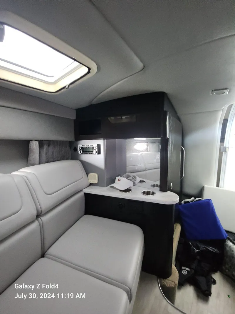 Slide: The Image of Interior of a 2018 Formula 310 Sun Sport boat with modern seating and sleek design. - 35