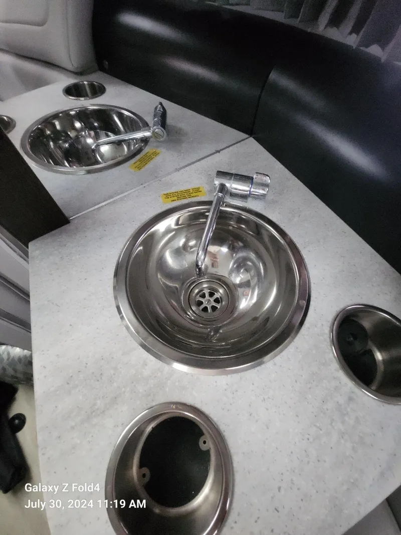 Slide: The Image of 2018 Formula 310 Sun Sport boat interior with stainless steel sink and countertop. - 36