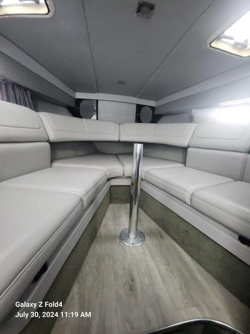 Slide: The Image of 2018 Formula 310 Sun Sport interior with white seating and modern design. - 38