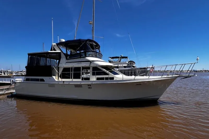 Slide: The Image of 1987 Tollycraft 44 Cockpit Motoryacht docked on a sunny day. - 1