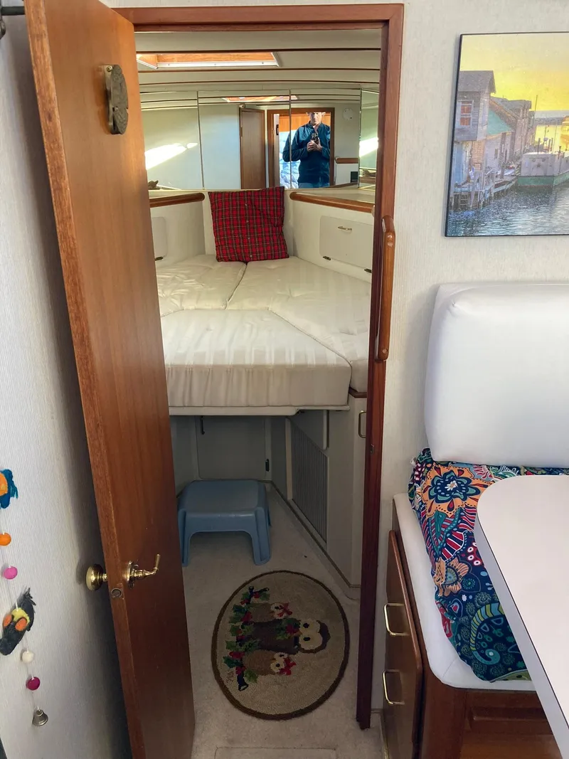 Slide: The Image of Interior of 1987 Tollycraft 44 Cockpit Motor Yacht with cozy cabin and nautical decor. - 42