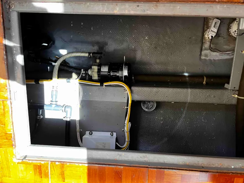 Slide: The Image of Engine compartment of a 1987 Tollycraft 44 Cockpit Motoryacht. - 52