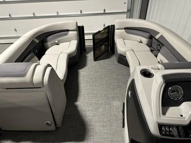 Slide: The Image of 2025 Barletta Boats Cabrio C24UE interior with luxurious seating and modern design. - 12