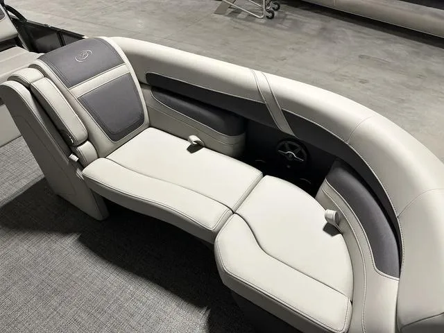 Slide: The Image of 2025 Barletta Boats Cabrio C24UE interior seating, luxury boat upholstery. - 13