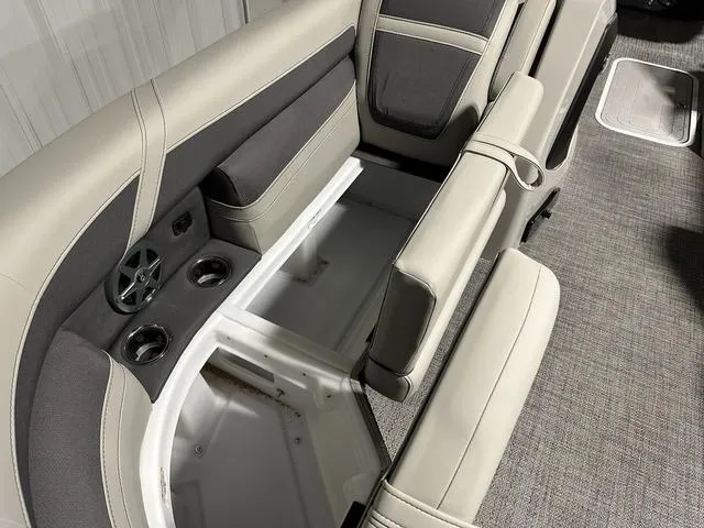 Slide: The Image of 2025 Barletta Boats Cabrio C24UE interior seating and storage compartments - 22