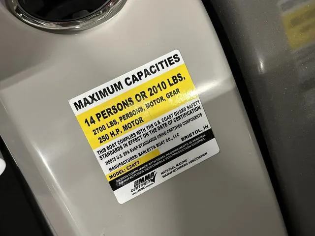 Slide: The Image of 2025 Barletta Boats Cabrio C24UE capacity label, 14 persons or 2010 lbs, 250 HP motor. - 29