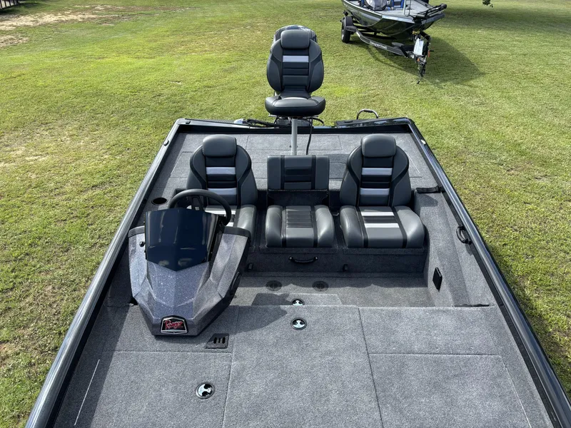 Slide: The Image of 2024 Ranger RT188P fishing boat interior with seating and steering console. - 13