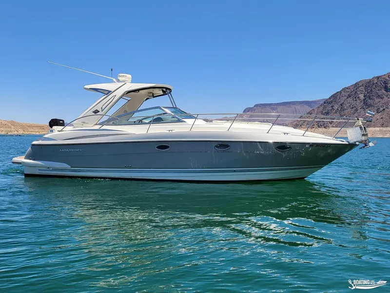 Slide: The Image of 2008 Monterey 350 Sport Yacht on clear blue water with mountainous background. - 10