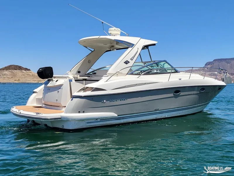 Slide: The Image of 2008 Monterey 350Sport Yacht on clear blue water with scenic background. - 11