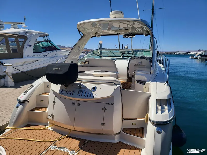 Slide: The Image of 2008 Monterey 350 Sport Yacht docked at marina, rear view. - 14