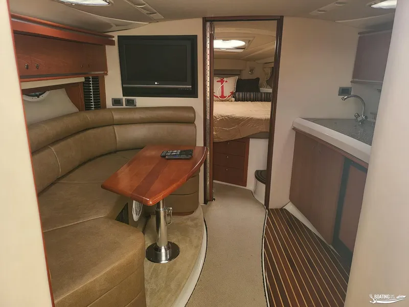 Slide: The Image of Interior of 2008 Monterey 350Sport Yacht with leather seating, TV, and kitchenette. - 30