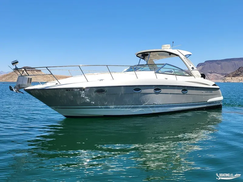 Slide: The Image of 2008 Monterey 350 Sport Yacht on clear blue water with scenic background. - 4