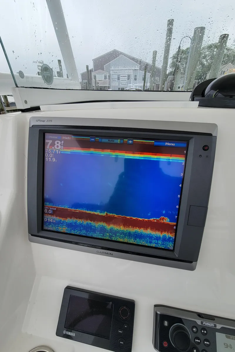 Slide: The Image of 2014 Regulator 28 Forward Seating boat with fish finder and navigation display. - 5