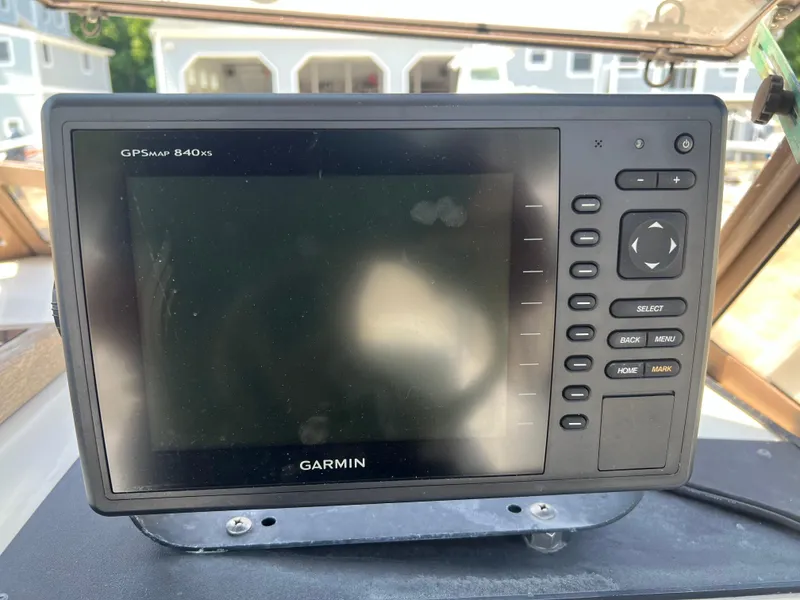 Slide: The Image of Garmin GPSmap 840xs on 1985 Mako 258 Cuddy boat dashboard. - 12