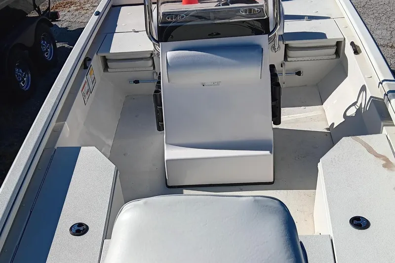 Slide: The Image of 2024 Ranger RB190 boat interior with console and seating. - 5